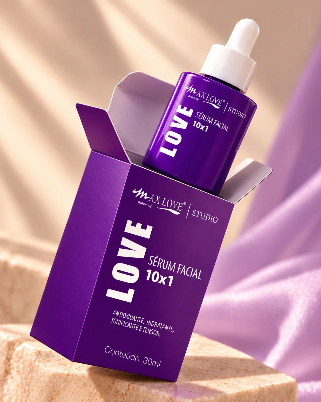 Sérum Facial 10x1 Max Love Studio, 30 ml: frasco violeta com conta-gotas branco saindo da caixa